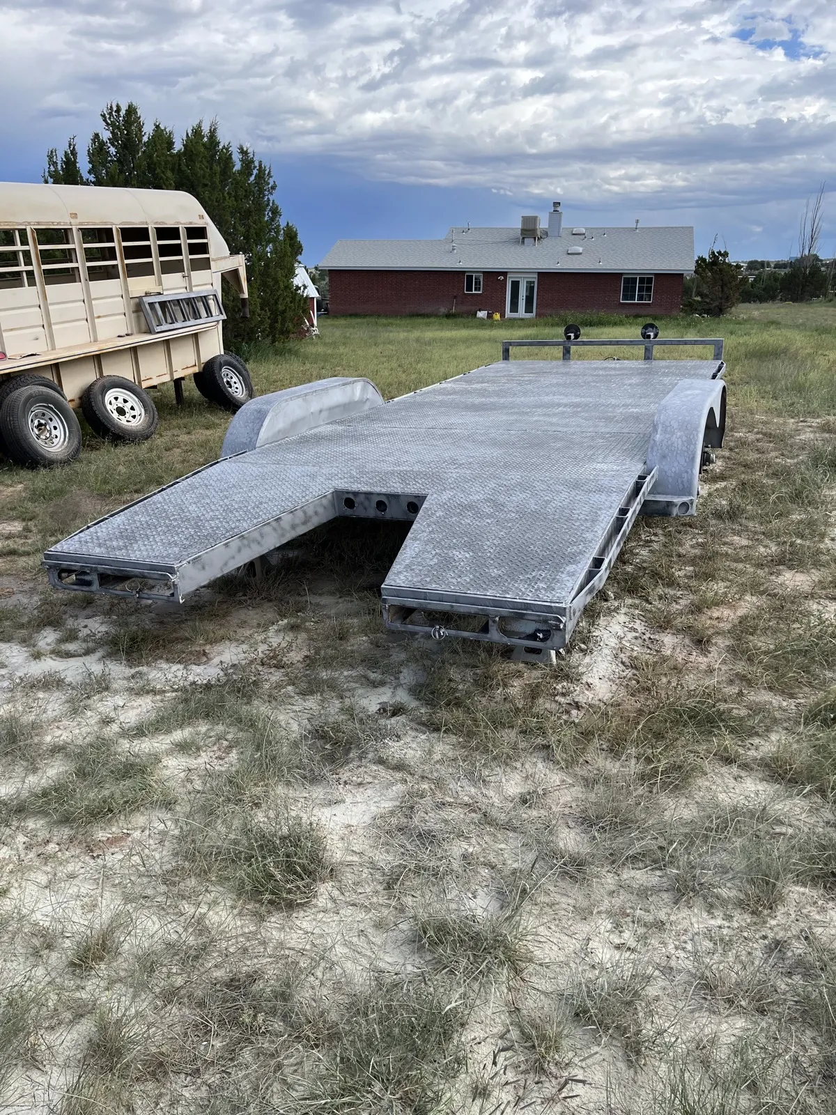 The same car hauler blasted back to bare metal.