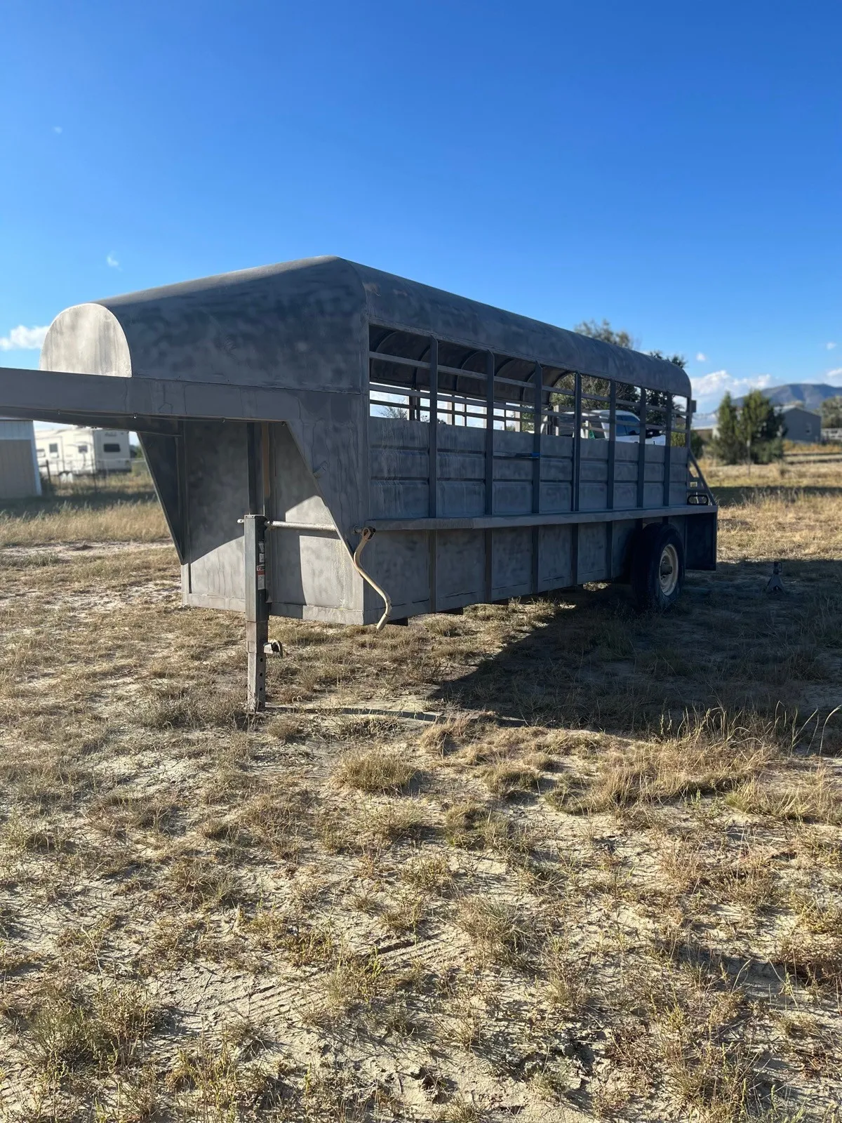 The same stock trailer stripped back to clean metal.