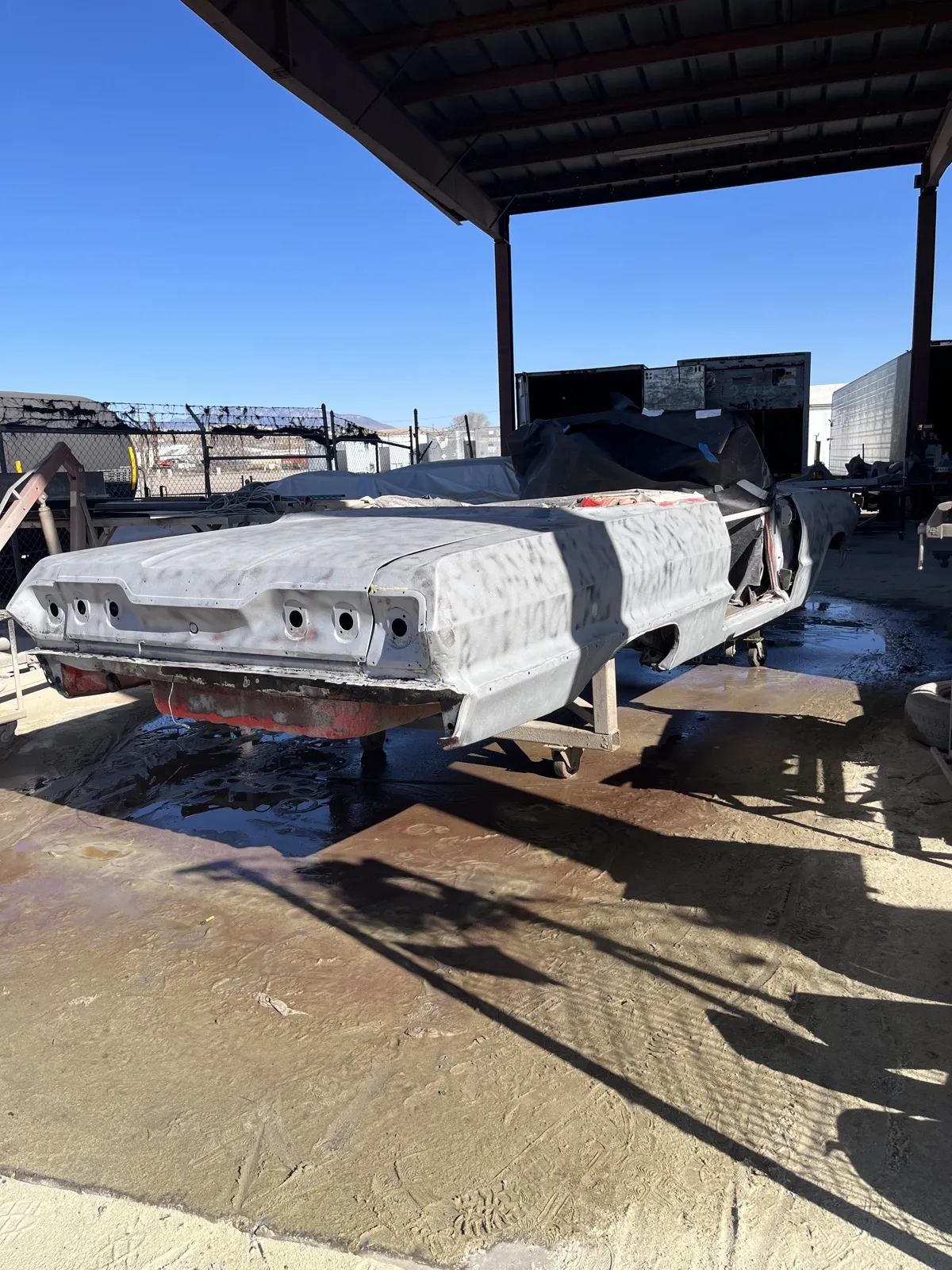 The same 1963 Impala stripped to clean bare metal.